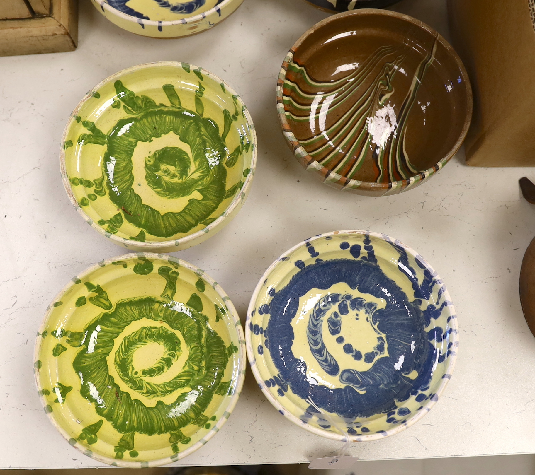Six French slipware bowls, each 16cm in diameter